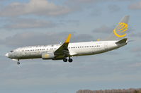 YL-PSD @ EGSH - Landing at Norwich with half the aircraft in bare metal and the other in livery. - by Graham Reeve