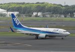 JA05AN @ NRT - Taxying for departure - by Keith Sowter