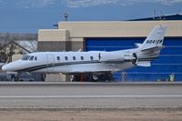 N841DW @ KBOI - Landing roll out on RWY 10R. Debris under engine is blown left main tire. - by Gerald Howard