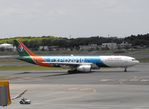 B-6100 @ RJAA - Taxying for departure - by Keith Sowter