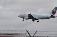 C-GARG @ CYYC - A319 short final on RWY 35L YYC - by Sohaib Akhter