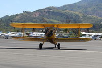 N75753 @ SZP - 1942 Boeing Stearman A75N1 (PT-17) as Navy N2S-4, Continental W670 220 Hp radial, taxi off the active - by Doug Robertson