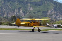 N75753 @ SZP - 1942 Boeing Stearman A75N1 (PPT-17) as Navy N2S-4, Continental W670 220 Hp radial, landing roll Rwy 22 - by Doug Robertson