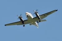 M-WATJ @ EGFH - Visiting King Air operated by Saxonhenge on long finals to Runway 22 - by Roger Winser