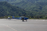 N8667H @ SZP - 1947 North American NAVION, Continental IO-520 285 Hp upgrade, landing roll Rwy 22. Young Eagles flight - by Doug Robertson