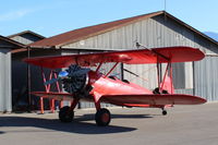 N68405 @ SZP - 1943 Boeing Stearman A75N1 (PT-17), P&W R-985 Wasp Jr. 450 Hp upgrade. Note left upper wing-mounted camera. - by Doug Robertson