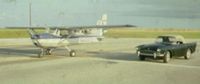 N4597U @ TLH - Long before 911.  Easy access to general aviation parking. - by Harold McLean