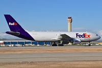 N663FE @ KBOI - Take off roll on RWY 28R. - by Gerald Howard