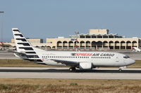 TS-ICA @ LMML - B737-300 TS-ICA Express Air Cargo - by Raymond Zammit