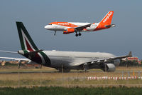 G-EZEV @ LIRF - Short final on rwy 16R - by Jens Achauer