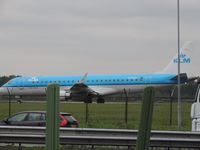 PH-EZV @ EHAM - KLM EMBREAR TAXING TO RUNWAY 36C - by fink123