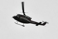 N362EH @ EGFH - Bell 212 helicopter approaching Swansea Airport. - by Roger Winser
