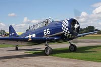 G-BUKY @ EGBR - Canadian Car & Foundry T-6H Harvard at Breighton Airfield's Summer Madness & All Comers Fly-In. August 22nd 2010. - by Malcolm Clarke