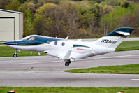 N120HF @ KBVY - HondaJet N120HF landing on runway 34 at Beverly Regional Airport. - by Samuel D.