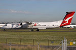 VH-LQG @ YSSY - taxi to 16L - by Bill Mallinson