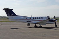 M-WATJ @ EGFH - B200GT, Mann Air Charter, Caernarfon Wales based, previously N8019D, seen parked up. - by Derek Flewin