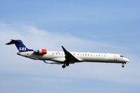OY-KFB @ EKCH - OY-KFB landing rw 22L - by Erik Oxtorp