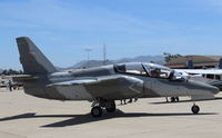 N40TG @ CMA - 1985 SIAI Marchetti S.211 Jet Trainer, one P&W(C)JT15D-4C turbofan, max cruise at 25,000' 360 kts. Max initial ROC 4,200 ft./min. Serv. ceiling 40,000 ft. Ferry range w/ ext. fuel-1,340 N mi. - by Doug Robertson