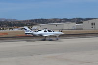 N33KT @ CMA - 2004 LANCAIR ES, Continental TSIO-550 350 Hp, Experimental class, taxi to overflow parking area, at AOPA FLY-IN - by Doug Robertson