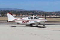 N9764Y @ CMA - 1963 Beech 35-B33 DEBONAIR, Continental IO-470-J 225 Hp, taxi to overflow parking area, AOPA FLY-IN - by Doug Robertson