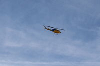 N212VC @ CMA - 1975 Bell 212 TWIN TWO TWELVE, one 1,800 sHp derated to 1,290 sHp PT6T-3 or PT6T-3B Turbo Twin Pac-2 coupled PT6 turboshafts in common gearbox, Sheriff's #9 descent to land - by Doug Robertson