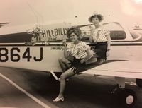 N864J - My Mother, Maybelle Fletcher, pictured here on the left, ready for a cross-country air race in about 1975-76. The sponsor was Hillbilly Bread therefore the corncob pipes! N864J Mother passed away at 92 yrs of age last year.  (Prob Hobby Airport)