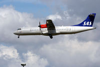 OY-JZF @ EKCH - OY-JZF landing rw 22L - by Erik Oxtorp