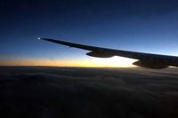 ZK-OKB @ NZAA - Sunset on the Tasman (AKL-SYD) - by Micha Lueck