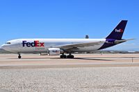 N676FE @ KBOI - Taxiing on Alpha. - by Gerald Howard