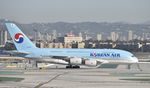 HL7627 @ KLAX - Taxiing to gate at LAX - by Todd Royer