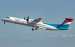 LX-LGE @ ELLX - departure via RW06 - by Friedrich Becker