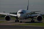 9V-SMH @ EGCC - just left 23R now taxing to its gate/stand - by andysantini