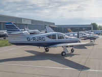 G-RJRC @ EGJB - Parked at Guernsey - by alanh