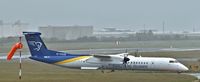 TF-FXI @ EGAC - Air Iceland Connect Dash 8 TF-FXI arriving at a very wet Belfast City with the first flight from Keflavík.