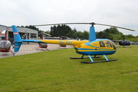 OE-XDT @ EGTB - Robinson R44 Clipper II at Wycombe Air Park. - by moxy