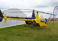 G-ULZE @ EGTB - Robinson R22 Beta at Wycombe Air Park. - by moxy