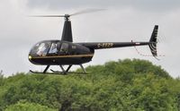 G-EEZR @ EGFH - Visiting R-44 Raven II - by Roger Winser