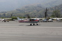 N714HH @ SZP - 1977 Cessna 150M, Continental O-200 100 Hp, landing roll Rwy 22 - by Doug Robertson
