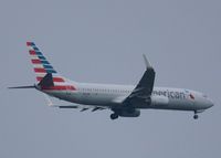 N802NN @ KDFW - At DFW. After a 45 minute hold because of severe storms, starting to land in heavy rain. - by paulp