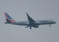 N245NN @ KDFW - At DFW. After a 45 minute hold because of severe storms, starting to land in heavy rain.
