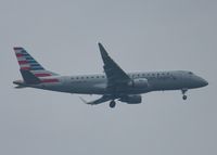 N229NN @ KDFW - At DFW. After a 45 minute hold because of severe storms, starting to land in heavy rain. - by paulp