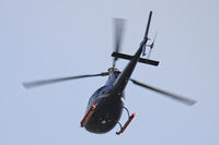 G-EJOC @ EGFH - Equreuil, CK's supermarket Ltd. Previously G-BIVP, G-SKIM, G-HMAN, G-GEDS, seen overflying the Airport. - by Derek Flewin