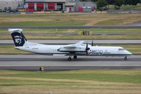 N434MK @ KPDX - DHC-8-402