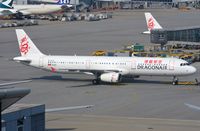 B-HTH @ VHHH - Dragonair A321 pushed back. - by FerryPNL