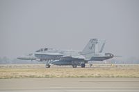 164638 @ KBOI - Taxiing to RWY 10R via Foxtrot. VMFA-323 “Death Rattlers, 3rd MAW, MAG-11, MCAS Miramar - by Gerald Howard