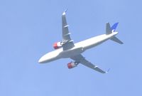 SE-ROB - Over Potters Bar, Herts having left LHR - by Chris Holtby