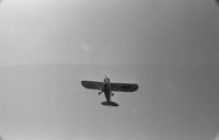 G-ARUC - G-ARUC flying over Fairoaks Airport, Surrey - by Roy Braydon