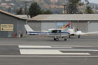 N704UT @ SZP - 1976 Cessna 150M, Continental O-200 100 Hp, holding short Rwy 22 - by Doug Robertson