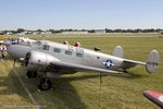 N7381C @ KOSH - Beech C18S CN 8104, N7381C