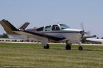 N4419A @ KOSH - Beech F35 Bonanza CN D-9147, N4419A - by Dariusz Jezewski  FotoDJ.com